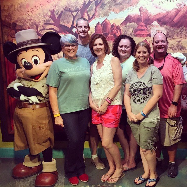 Mickey Mouse character meets walt disney world